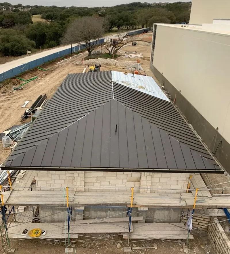 Metal roof new construction with scaffolding in Lehigh